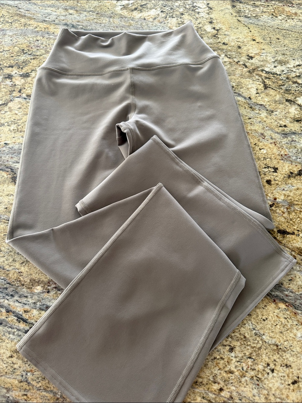 ALO Yoga Women's High-Rise Leggings in Taupe / beige flare leg